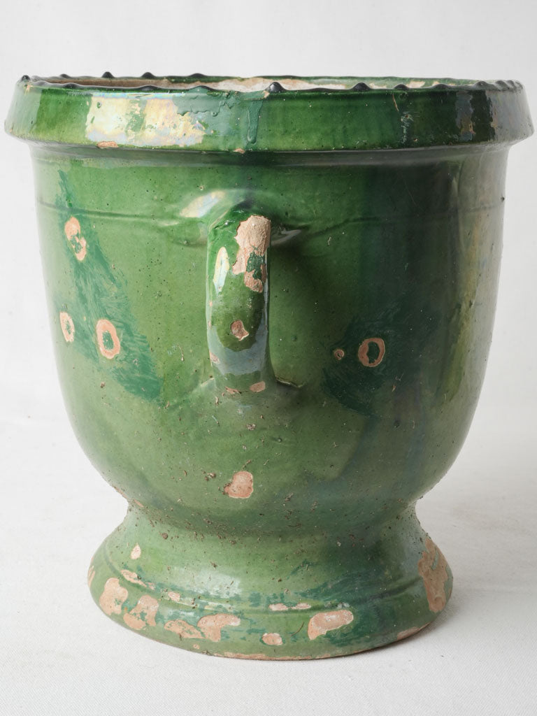 Elegant glazed terracotta plant holder