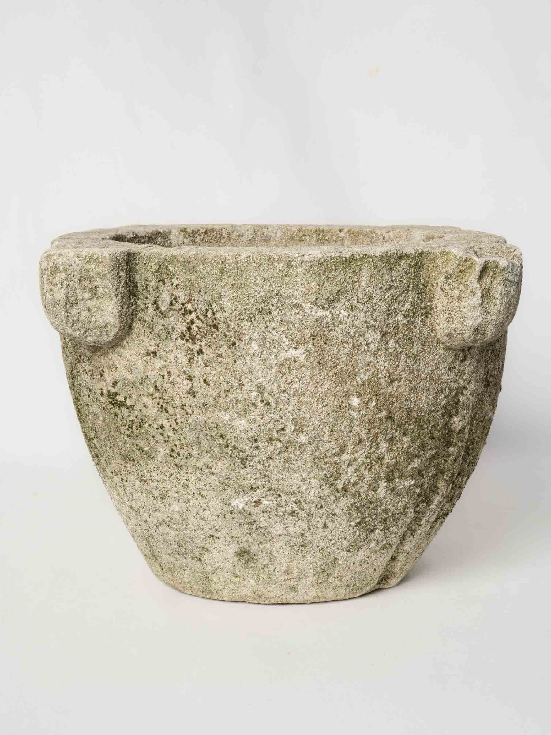 Aged cylindrical stone cachepot