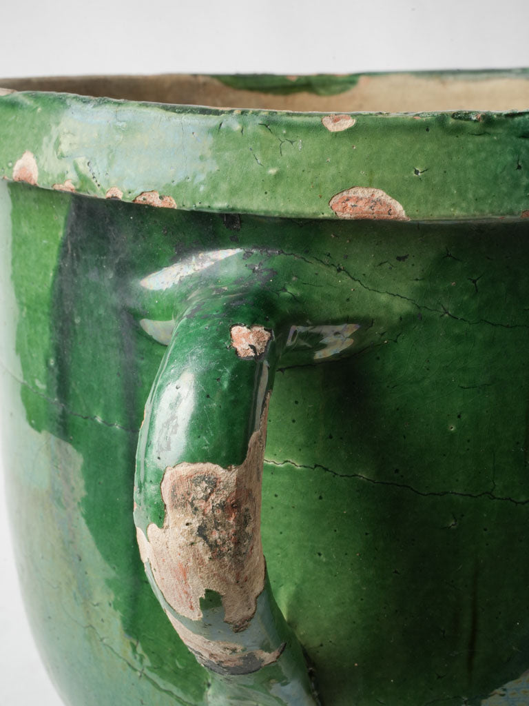 Distinctive vibrant green jardiniere.
