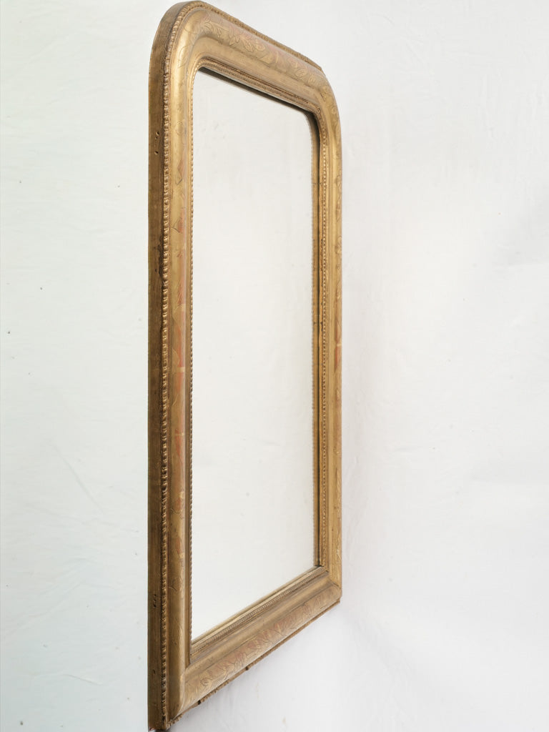 Aged patina ornate framed mirror