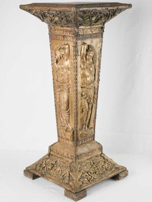 Antique brass-clad pedestal with nymphs