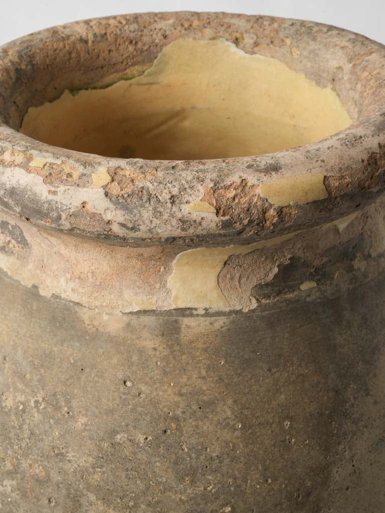 Distressed historic Biot jars