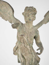 Historical brass-winged sculpture, missing arm