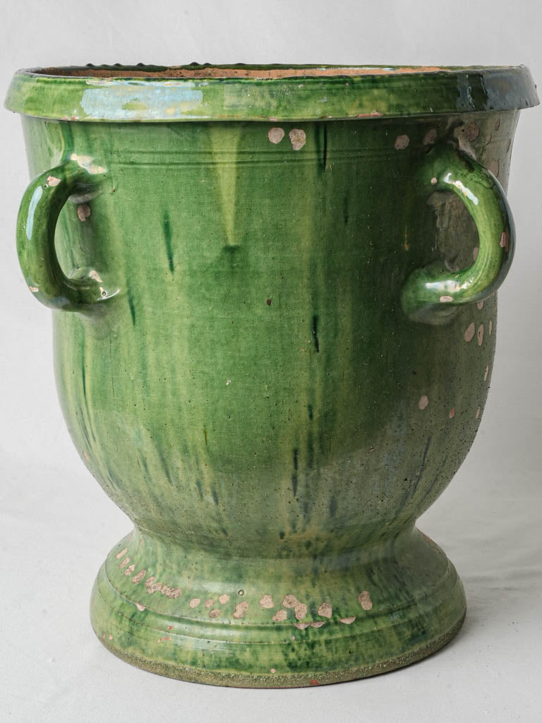 Antique green ceramic garden urn