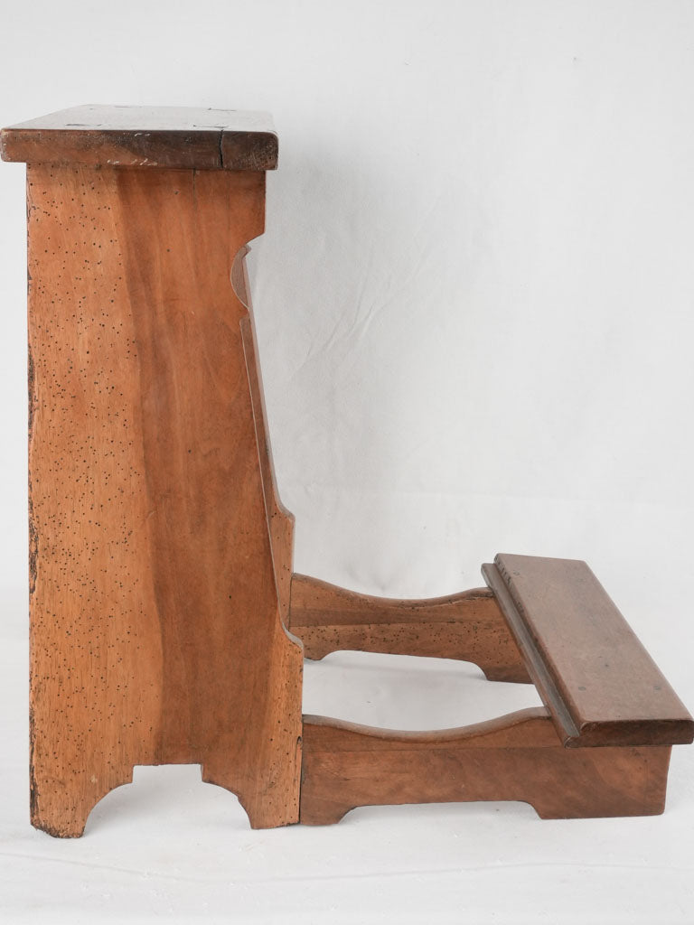 Time-worn walnut devotional kneeler seat