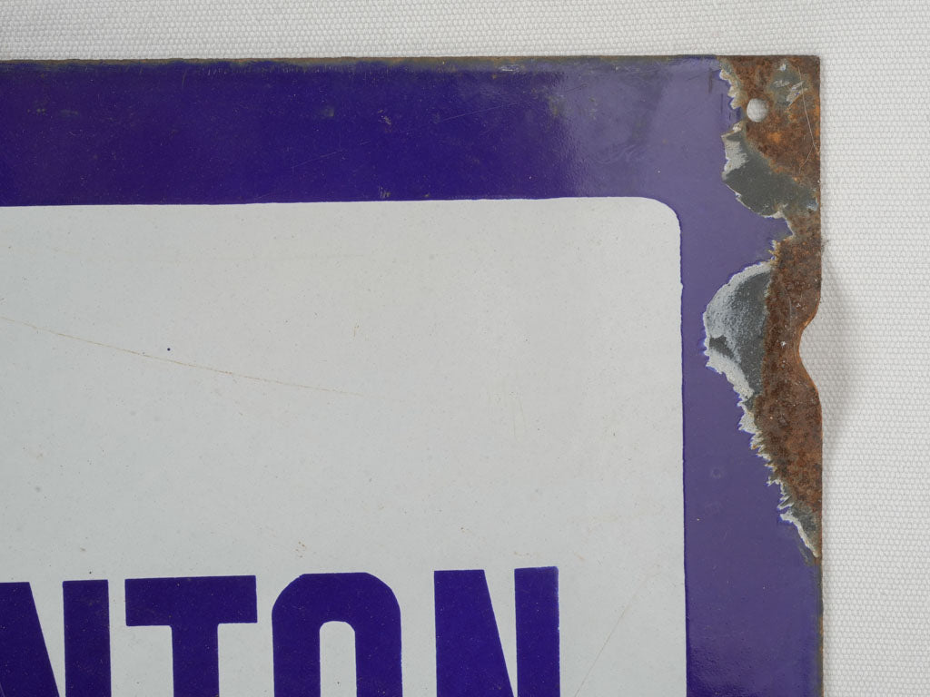 Worn antique metal metro plaque