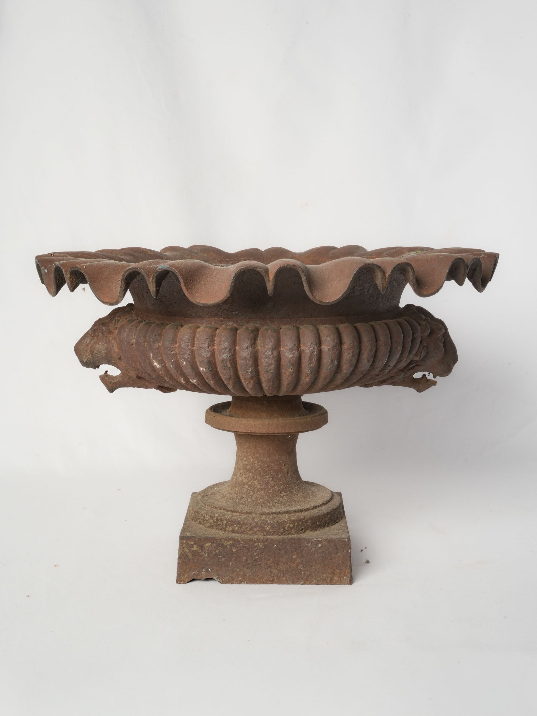 Weathered russet patina garden urn