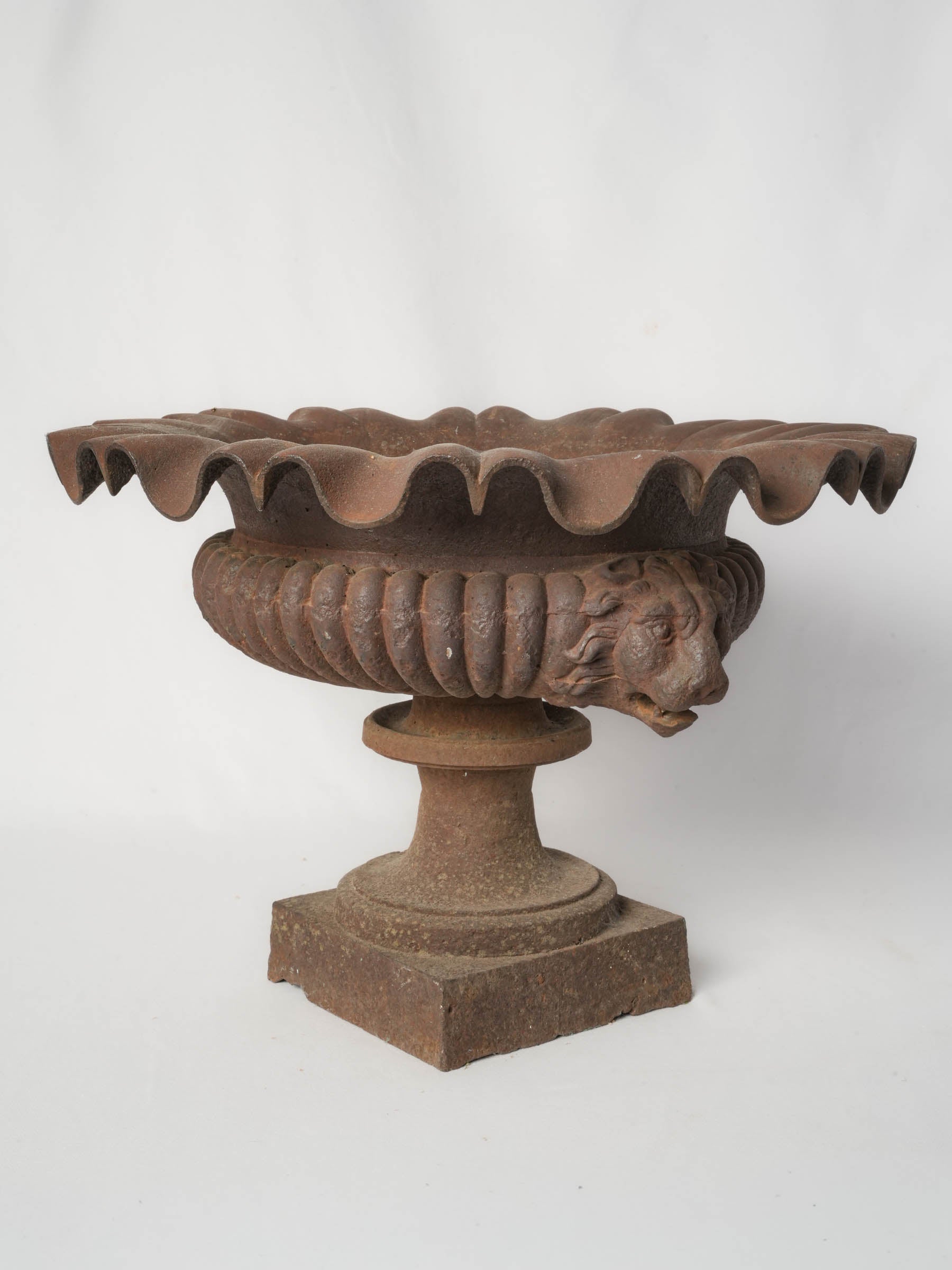 Sculptural lion mask handled urn