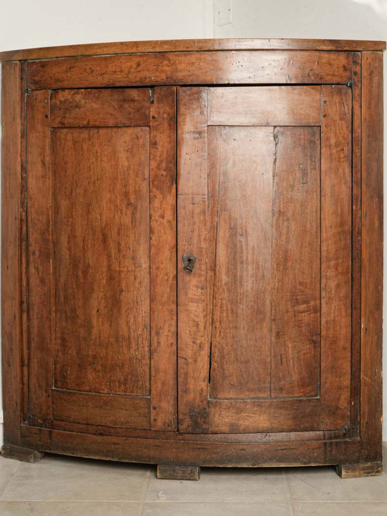 Rustic paneled corner cabinet