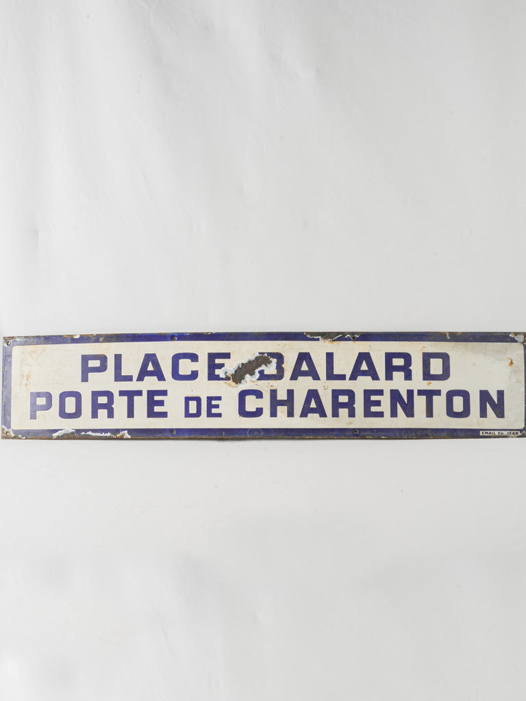 Vintage Parisian enameled metro sign
