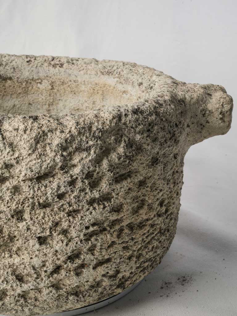 Mottled grey outdoor mortar basin