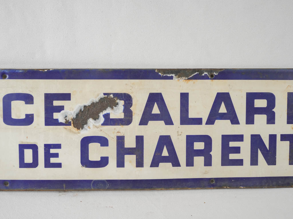 Rustic French metro direction sign
