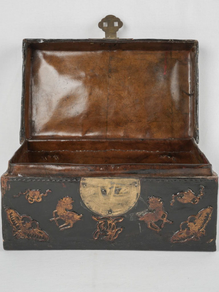Intricate 19th-century leather coffer
