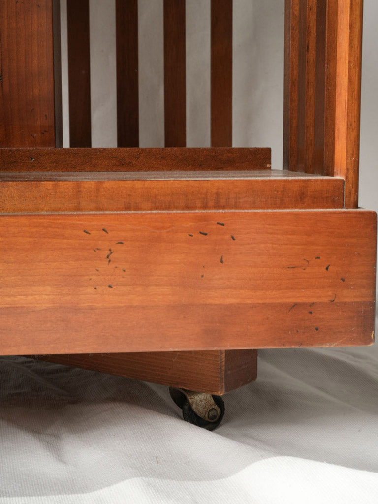Warm mahogany revolving bookshelf