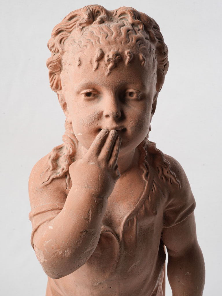 Softly modeled antique-style figure.