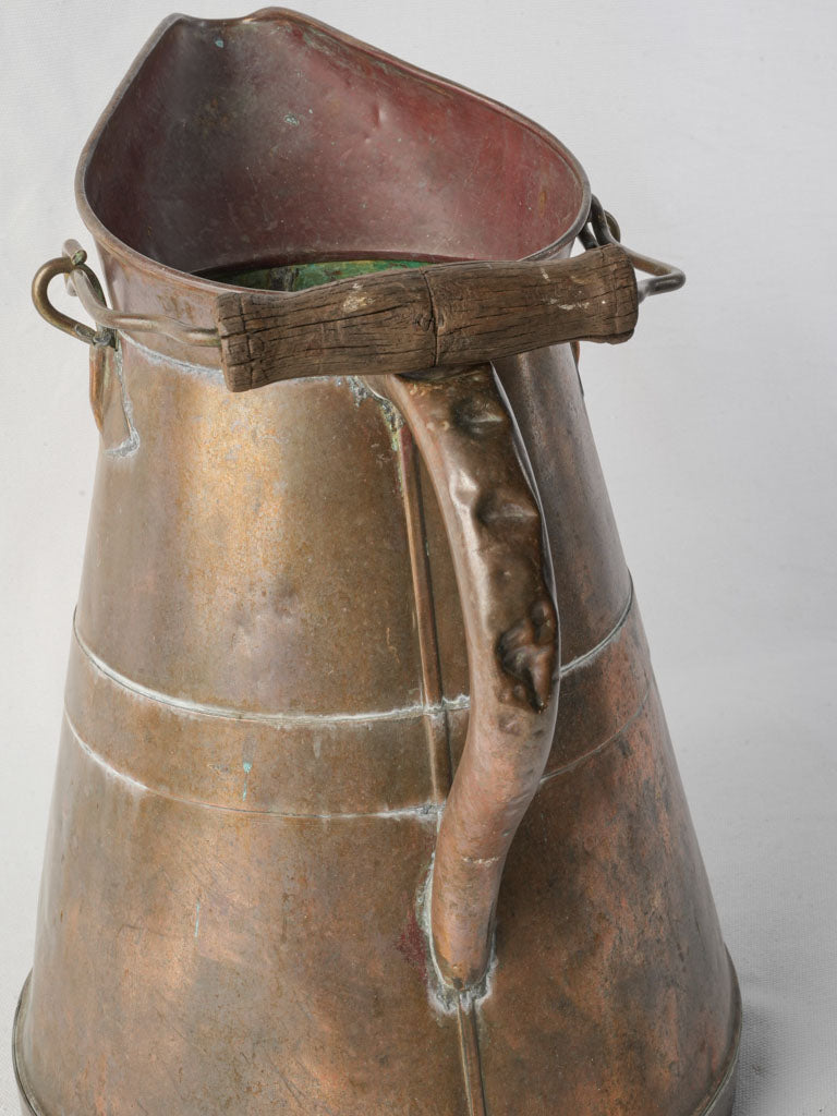 Timeworn copper vintage pouring tool