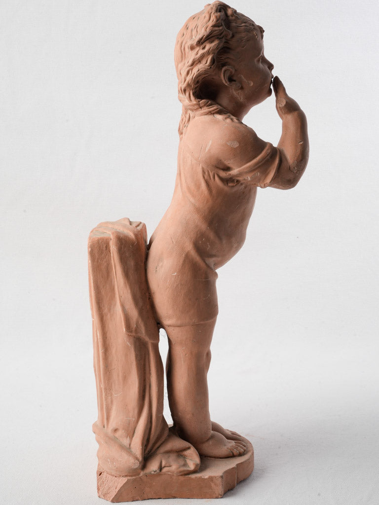 Endearing childhood expression figurine.