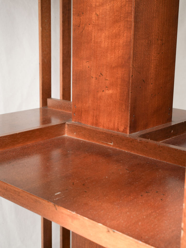 Functional revolving mahogany bookcase