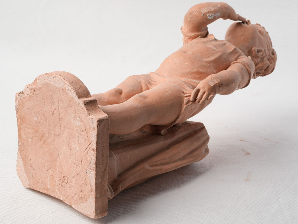 Naturalistic anatomy child statue.