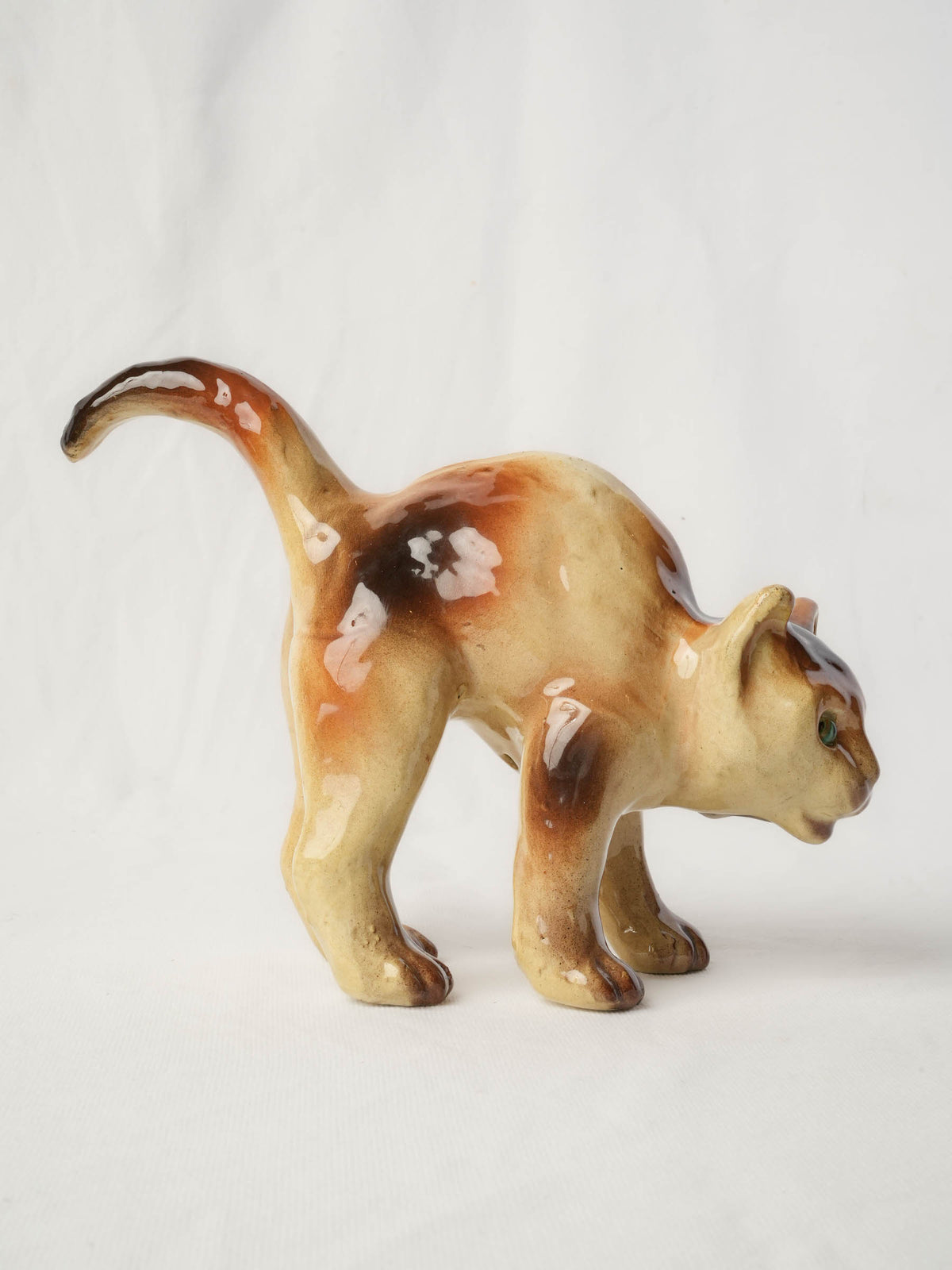 Playful Glazed Ceramic “Scaredy-Cat” Kitten, c. 1920 - 8" x 10¼"