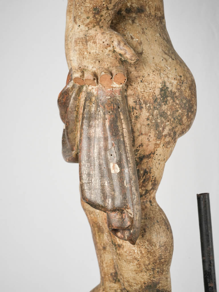 Antique, artisan-crafted cherub wooden sculptures