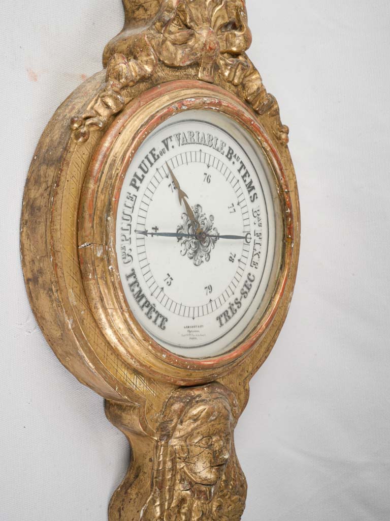 Intricate carved wooden barometer