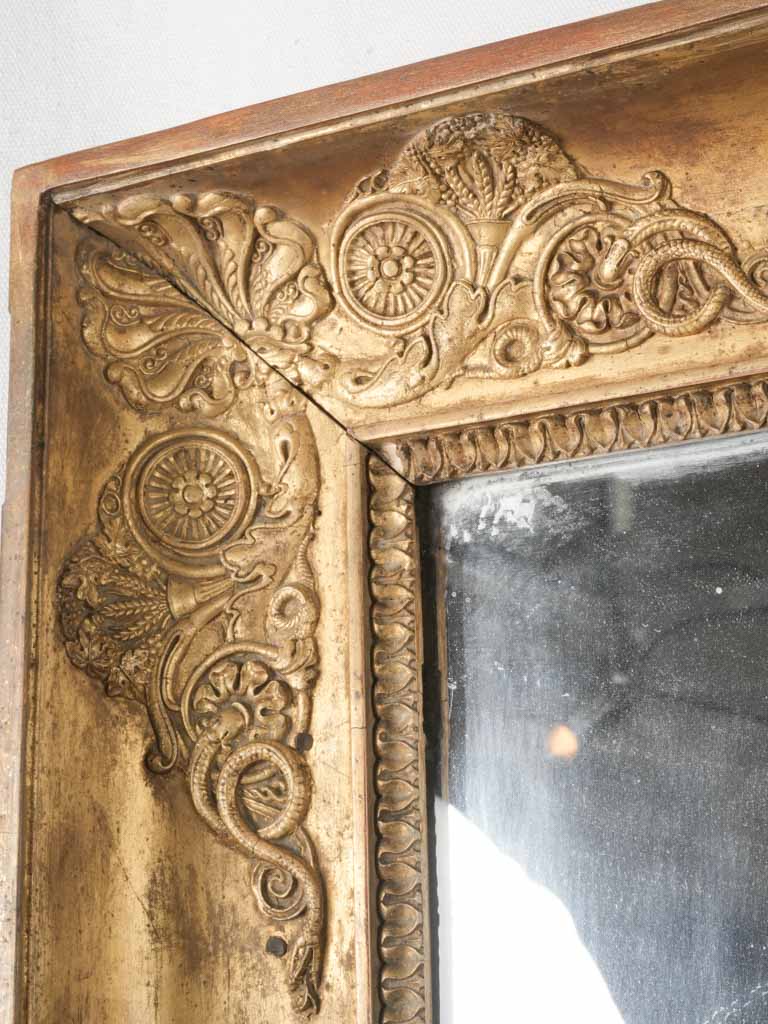 Intricate 19th-century craftsmanship mirror