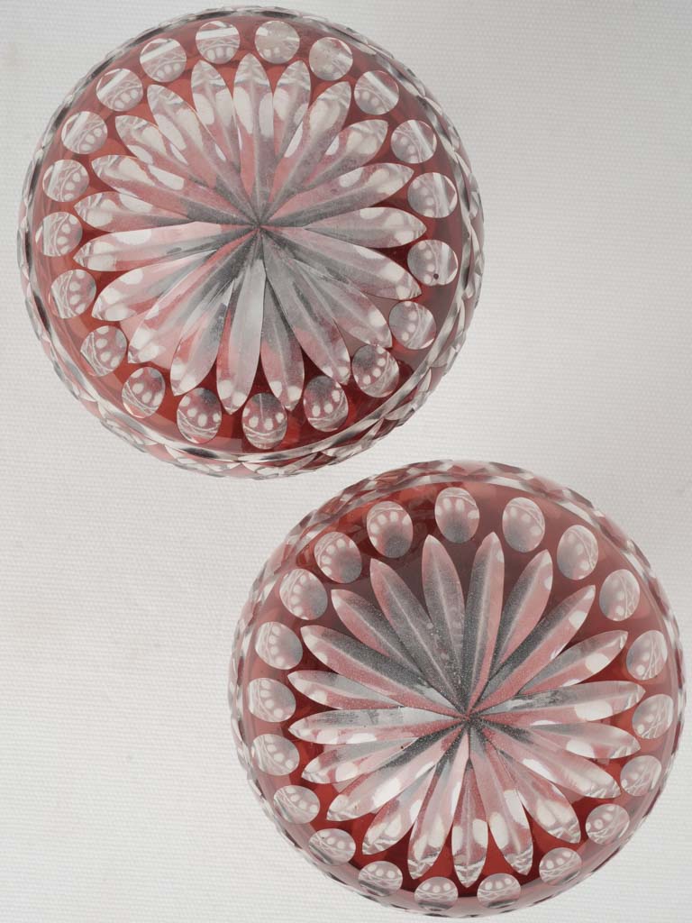 Ornate, maroon cut crystal staircase finials