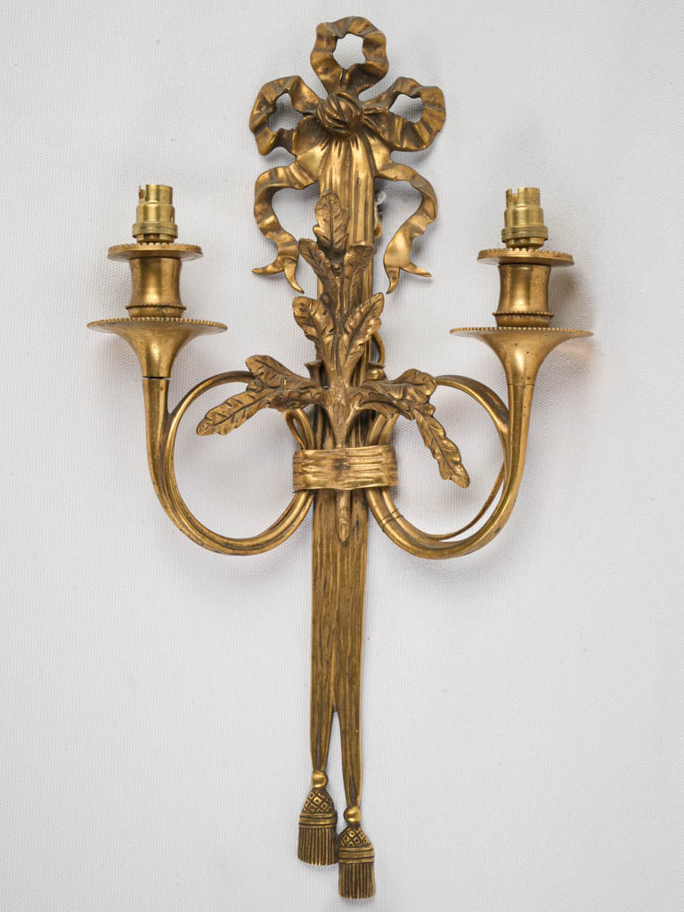 Elegant neoclassical bronze candle sconces