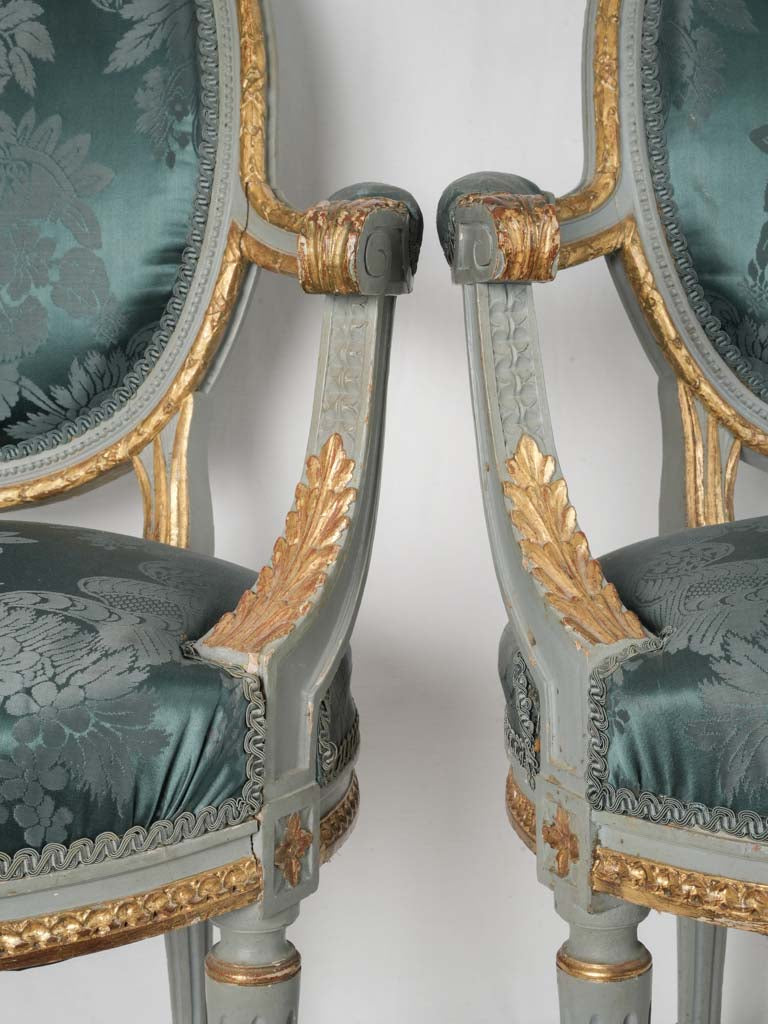Sophisticated gilded damask armchairs