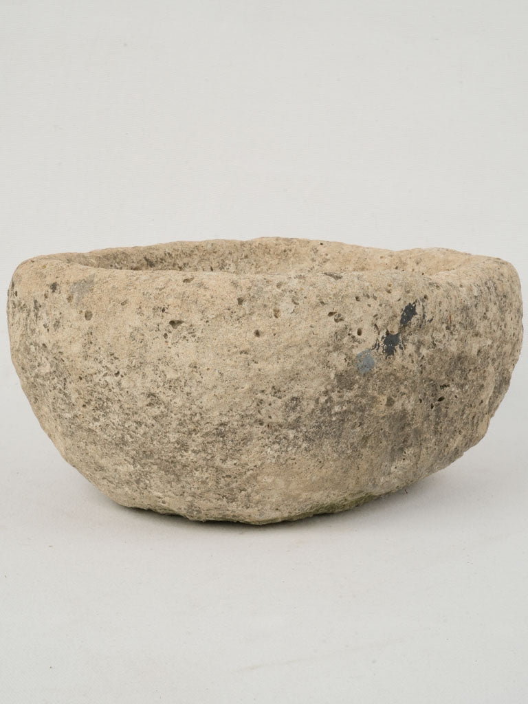 Aged oval stone trough planter