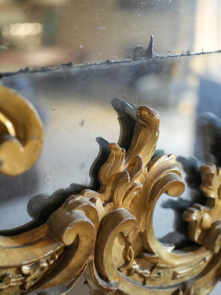 Richly gilded, vintage, ornate mirror