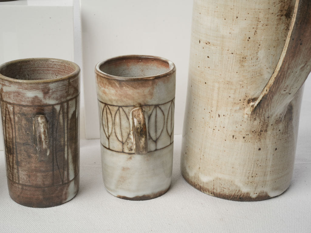Earthy-toned ceramic juice set