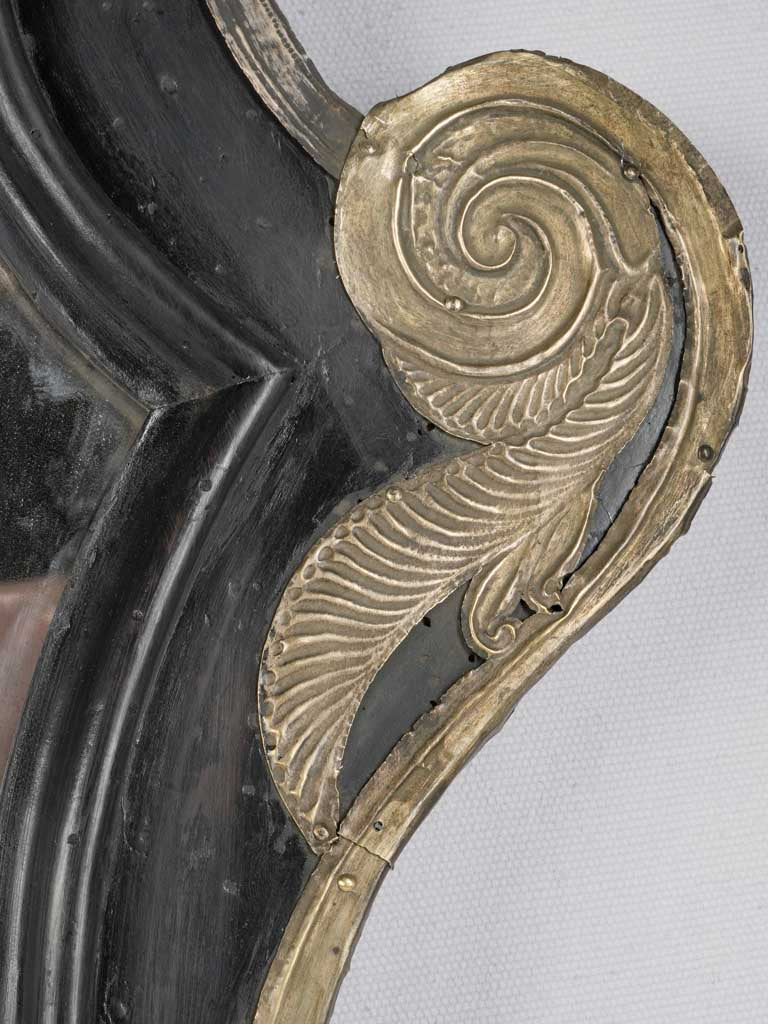 Sculptural symmetrical antique mirrors