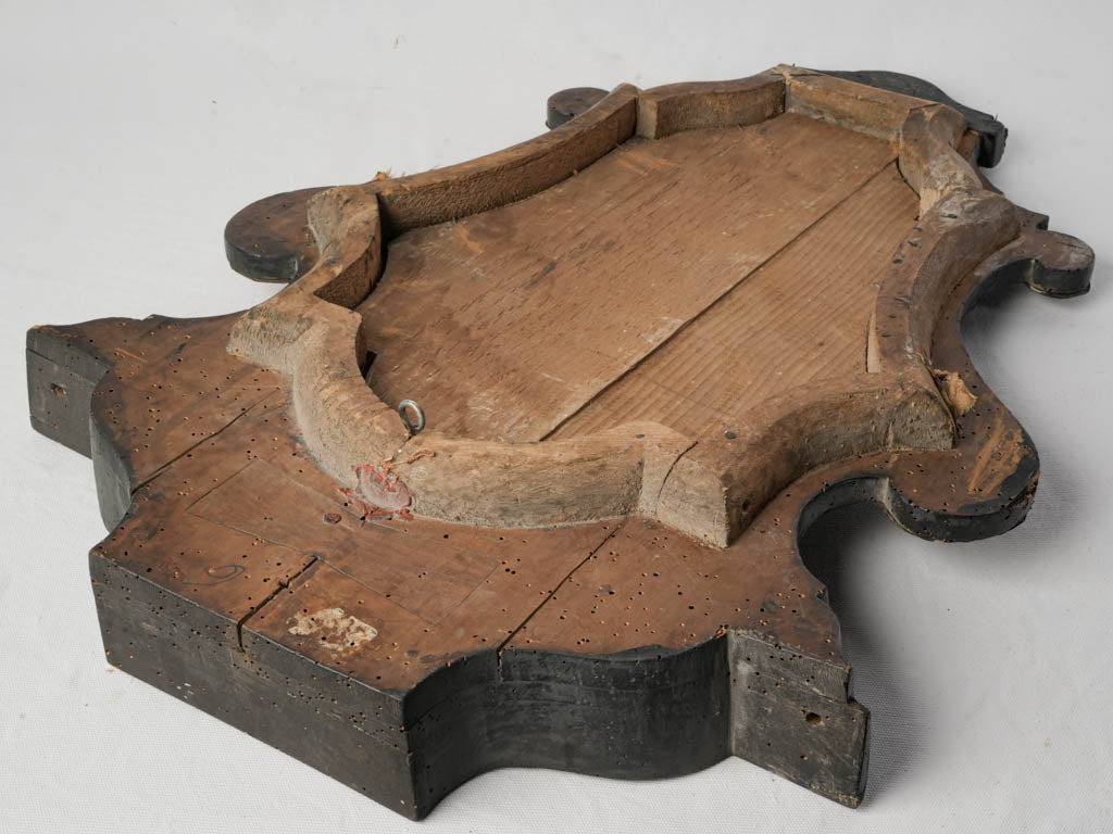 Beautifully contoured cartouche mirrors  