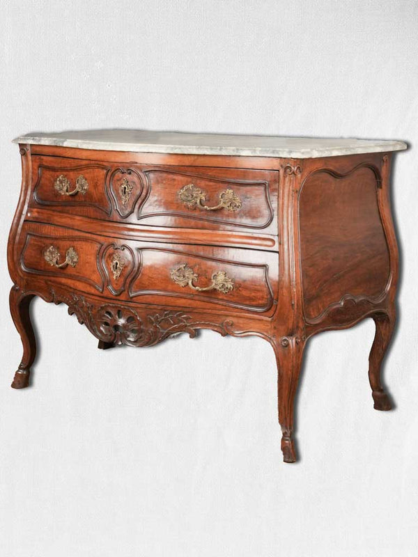 Antique Regence carved sauteuse commode