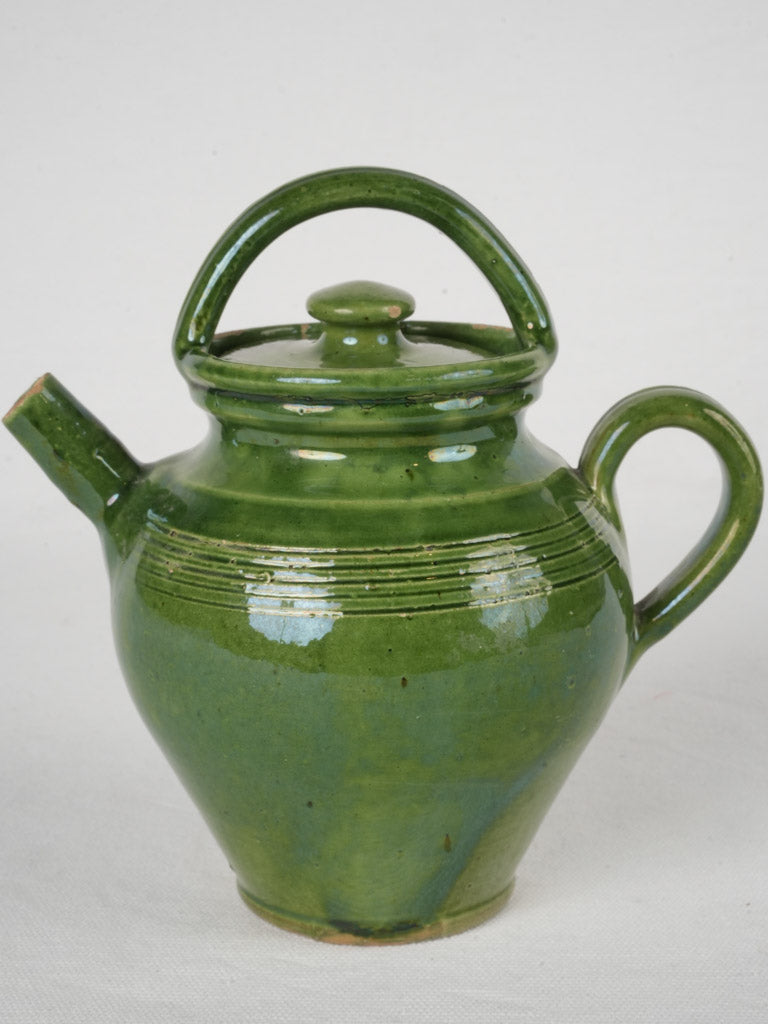 Petite rounded lidded pitcher