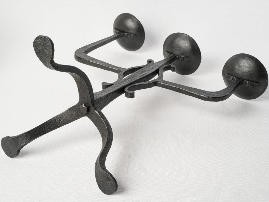Decorative sculpted metal candelabra piece