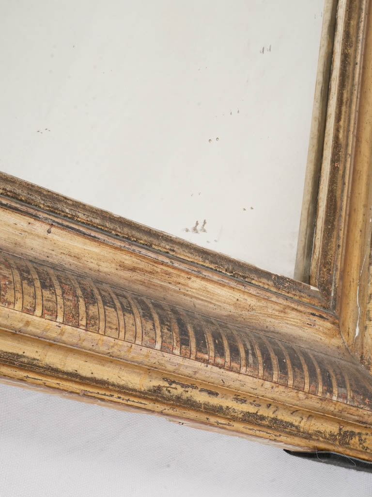 Warm aged shimmering glass mirror  