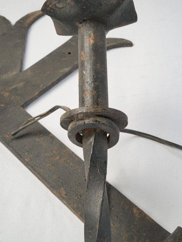 Medieval influenced wrought iron sconces