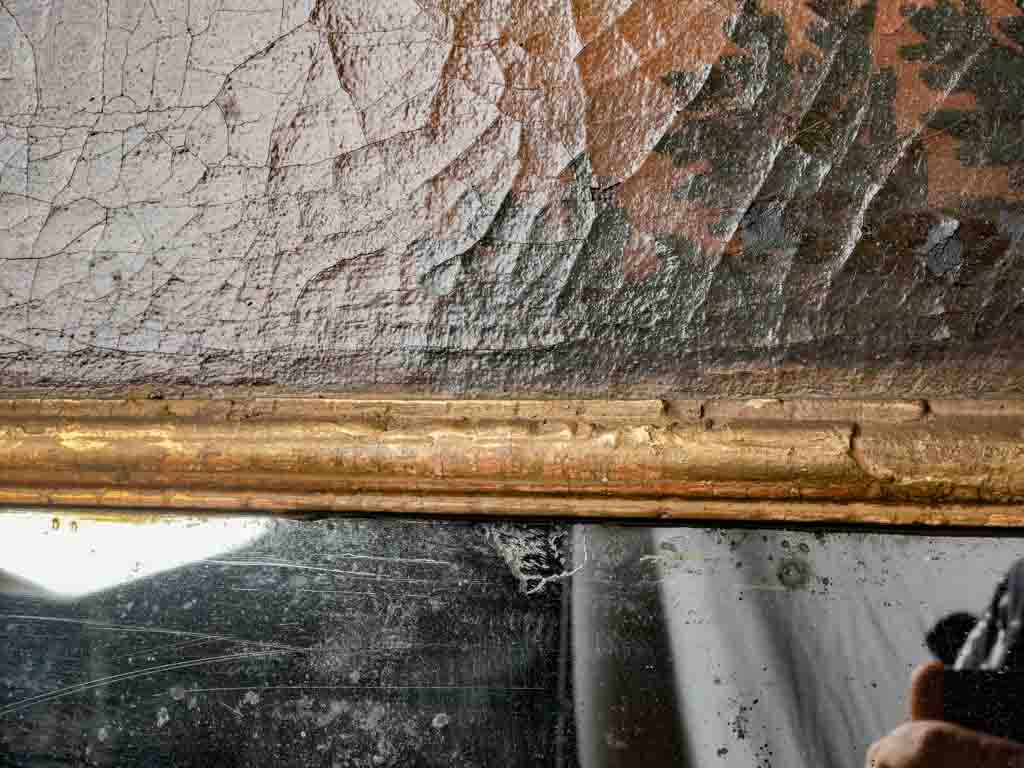 Time-worn romantic Trumeau mirror