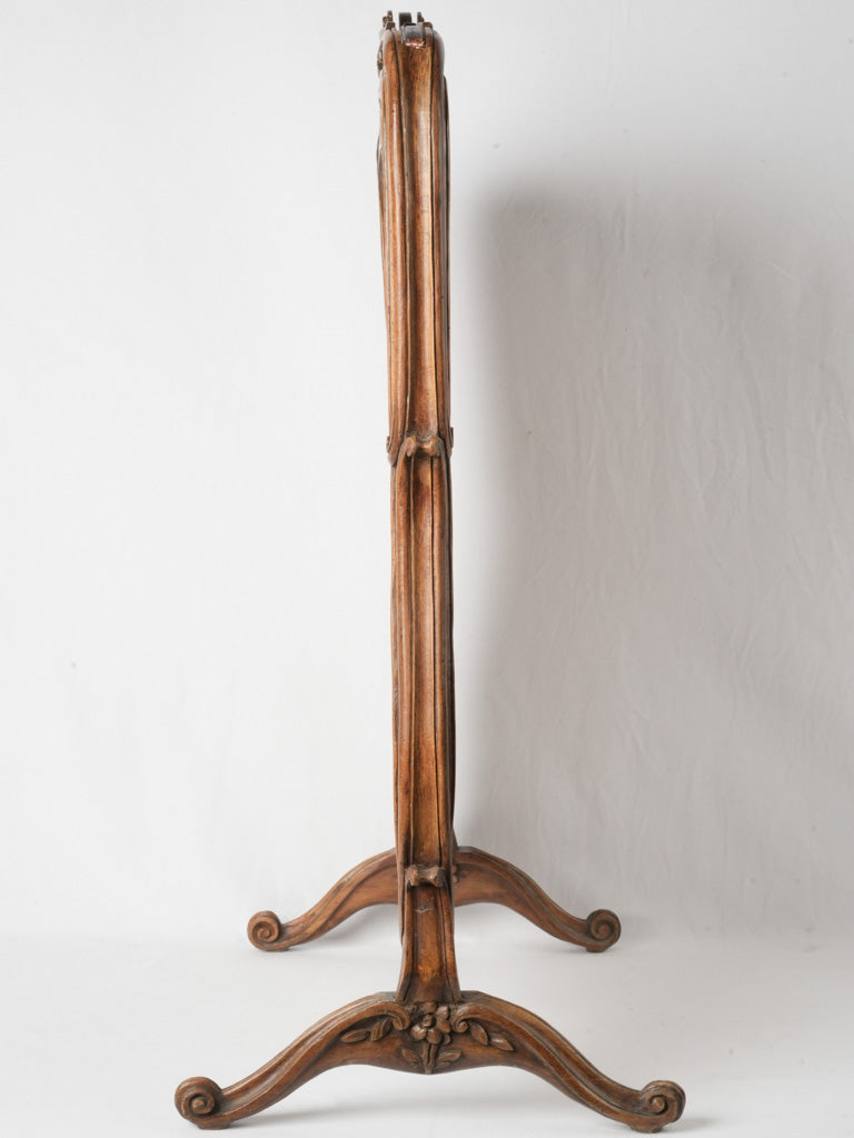 Hand-carved walnut fire screen