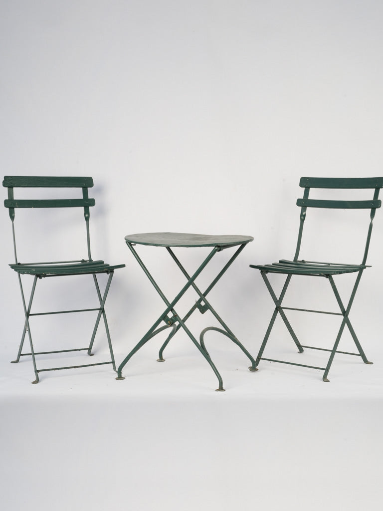 Antique French green iron children's chairs