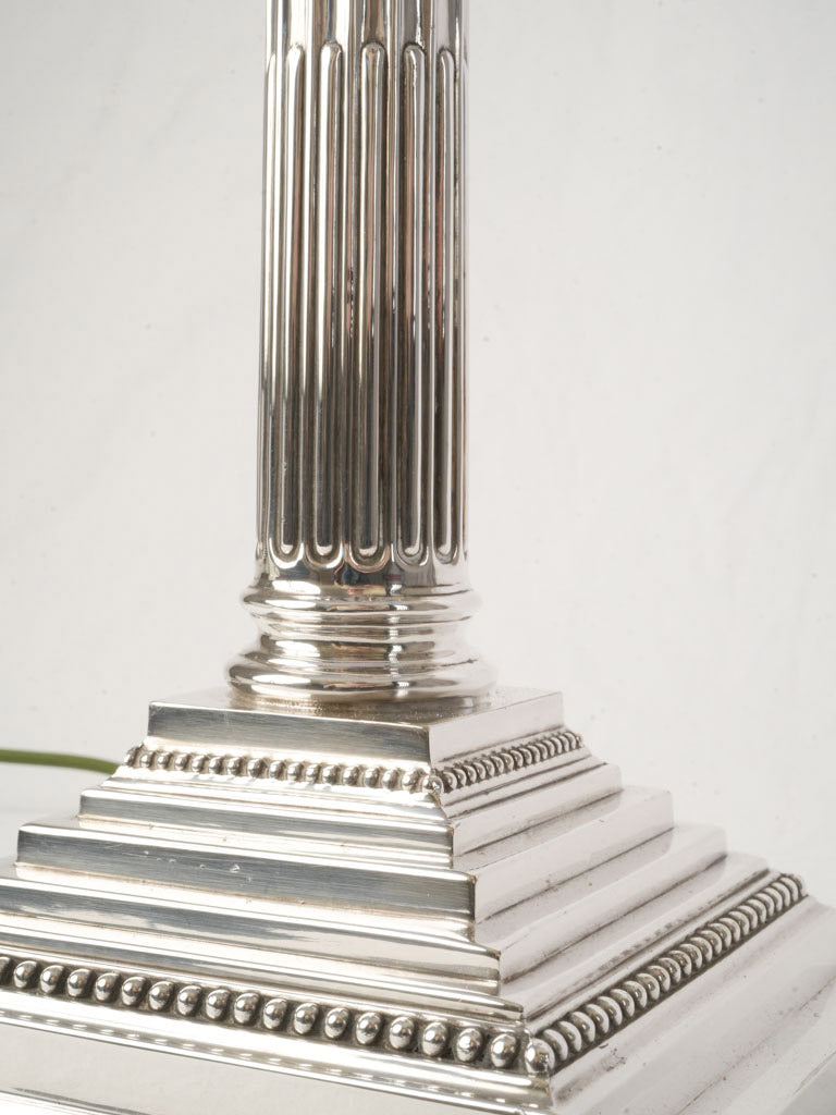 Polished silver plinth lamp