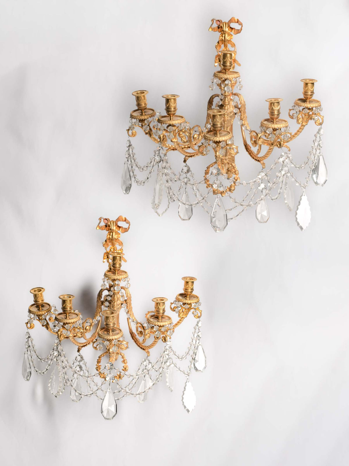 Exceptional Pair of French Gilt-Bronze and Crystal Wall Sconces with Ram’s-Head Decoration, Late 19th-Century- 19" x 21¼"