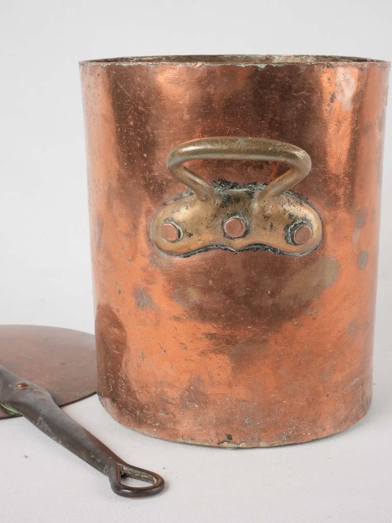 Classic long-handled copper casserole pot