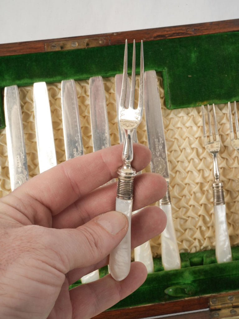 Timeworn case antique cutlery ensemble