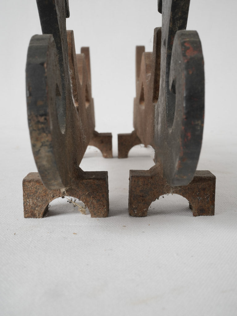 Patina-aged animal motif andirons