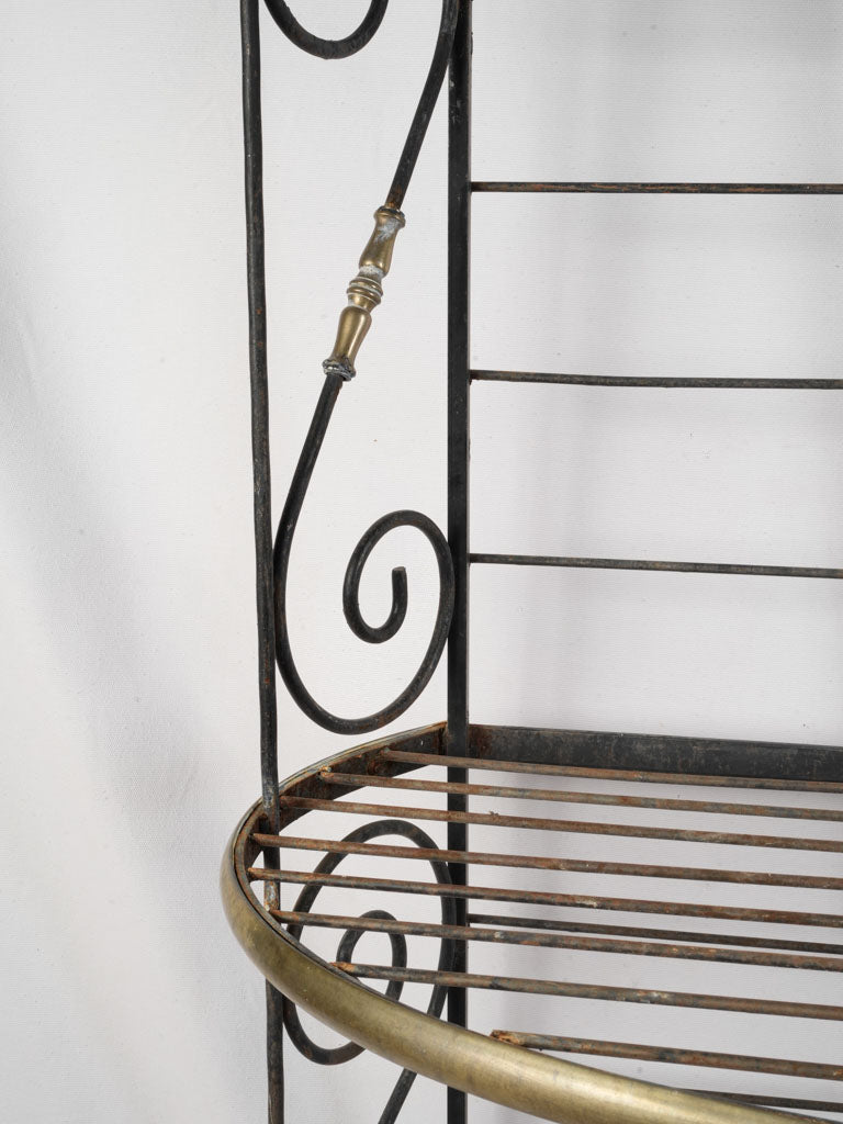 Gilded brass-colored framed baker's rack  