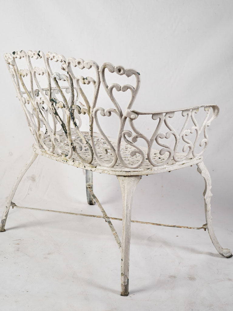 Heart-shaped detail cast aluminum bench  